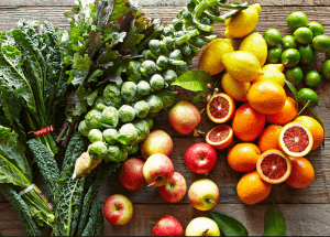 a group of fruits and vegetables on a wood surface Healthy Weight Loss Diets Thatcham